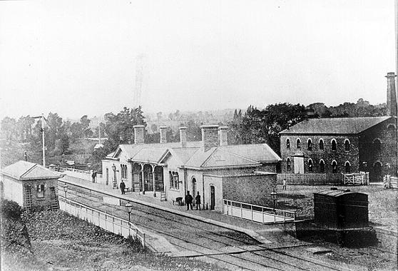 looking down towards the station from a hill or building